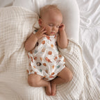Sunny Daze Bubble Romper by Blossom and Pear with coconut print cotton baby romper