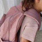 close view of Corduroy kids backpack with front pocket, laptop sleeve, health label, name label, options to personalise a name with embroidery, spacious. perfect for school or travel. this colour is dusty rose