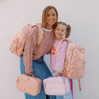 mum and daughter wearing Fox & Fallow backpack for kids, perfect for school, daycare and everyday use. Spacious, practical and designed for little adventures. Personalisation of embroidery with name also available on bags in 2 placements. This print is peach check