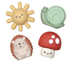 Four cute animal-shaped toys on a white background