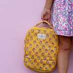 kids insulated lunch bag in yellow with pink floral pattern