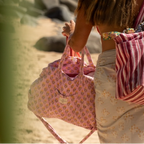 weekend bag for women with soft quilting and gold hardware