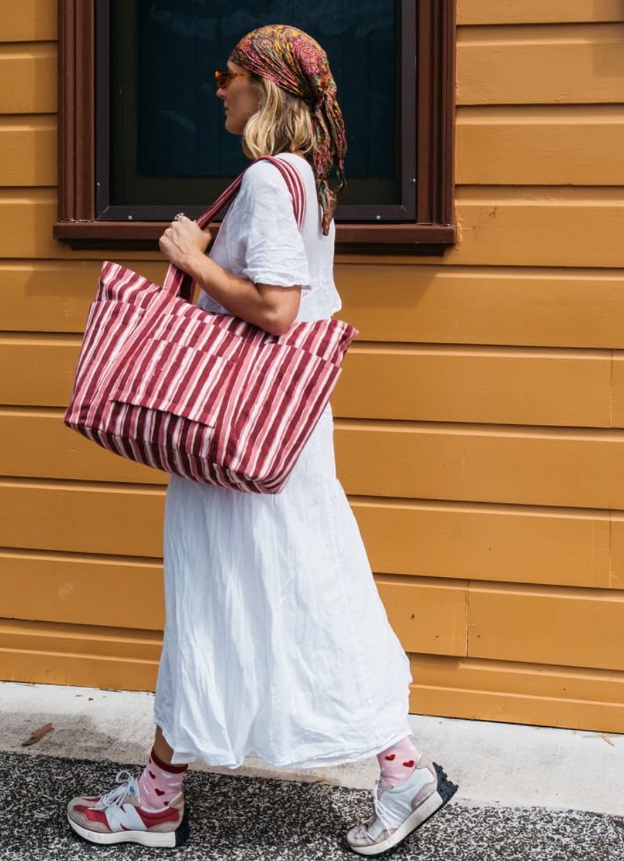 large striped handbag for carrying essentials and more