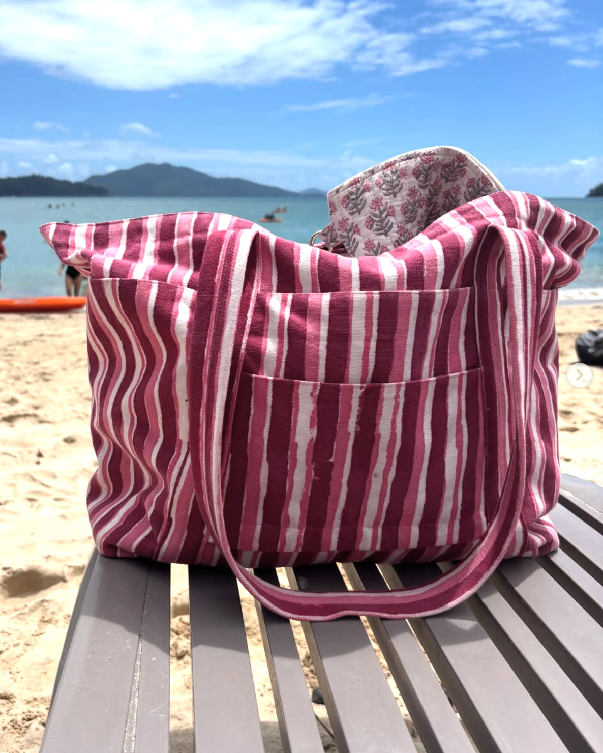 striped carry bag with roomy interior for daily essentials
