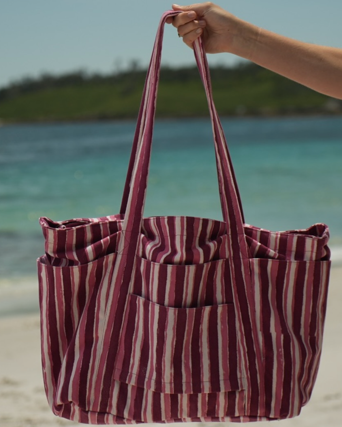 striped canvas tote bag with wide straps and soft structure