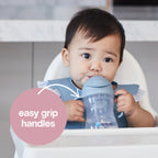 baby drinking from a b.box sippy cup with weighted straw for easy drinking
