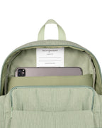 inside view of Corduroy kids backpack with front pocket, laptop sleeve, health label, name label, options to personalise a name with embroidery, spacious. perfect for school or travel. this colour is sage