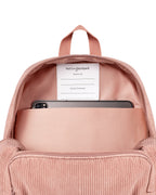 inside view of Corduroy kids backpack with front pocket, laptop sleeve, health label, name label, options to personalise a name with embroidery, spacious. perfect for school or travel. this colour is dusty rose