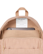 inside view of Corduroy kids backpack with front pocket, laptop sleeve, health label, name label, options to personalise a name with embroidery, spacious. perfect for school or travel. this colour is latte