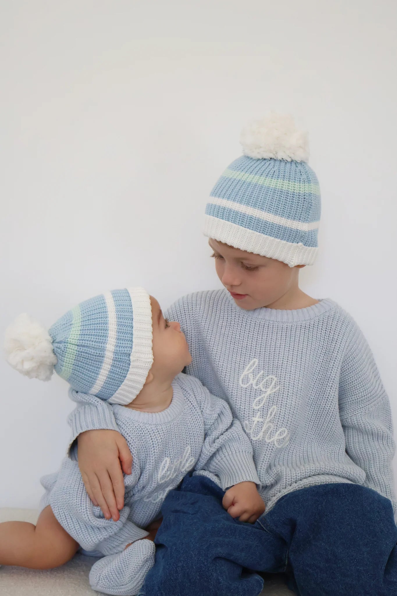 Powder blue embroidered Little Brother cotton knit romper for babies