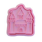stock image of playdough/clay stamp and cutter. Eco-friendly sensory play tool by brand playsense perfect for creative and imaginative play. can also be used for cookies and baking. pictured is princess castle