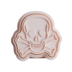 stock image of playdough/clay stamp and cutter. Eco-friendly sensory play tool by brand playsense perfect for creative and imaginative play. can also be used for cookies and baking. pictured is skull and bones