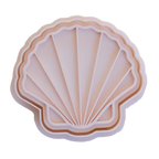 stockimage of playdough/clay stamp and cutter. Eco-friendly sensory play tool by brand playsense perfect for creative and imaginative play. can also be used for cookies and baking. pictured is sea shell