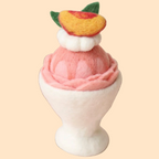 Peach sorbet felt sundae play food by Juni Moon in a white dessert cup for pretend kitchen and café play