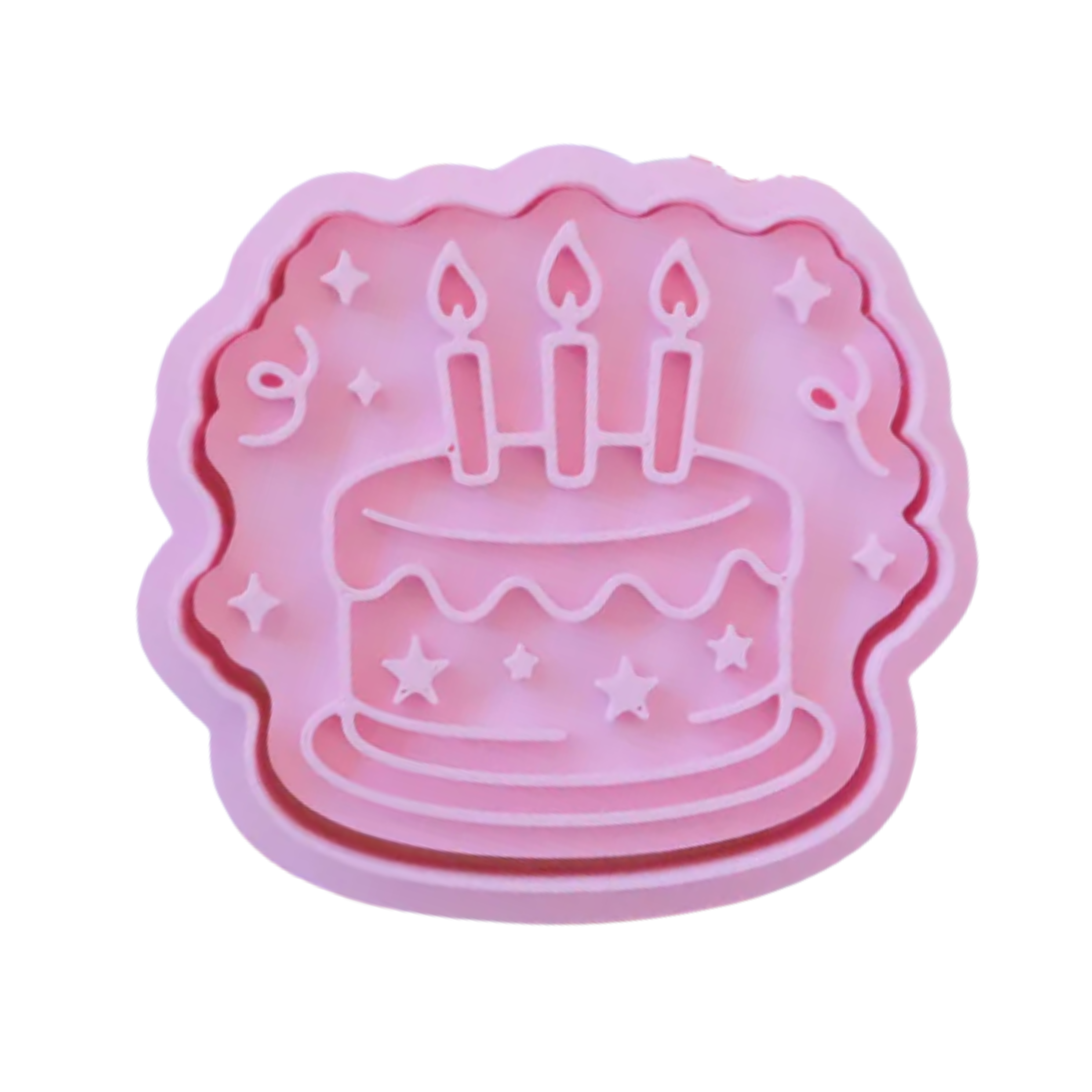 stock image of playdoughc/clay stamp and cutter. Eco-friendly sensory play tool perfect for creative and imaginative play. can also be used for cookies and baking. pictured is party cake