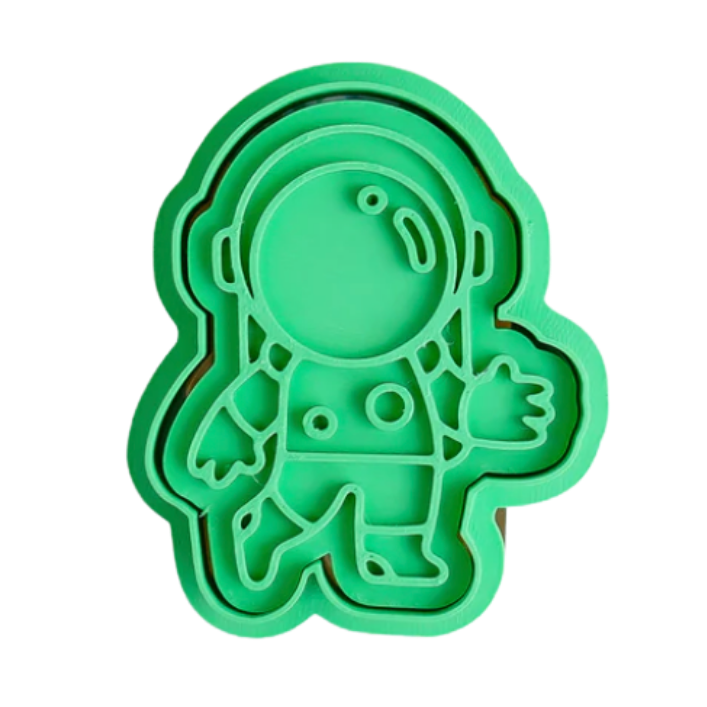 stock image of playdoughc/clay stamp and cutter. Eco-friendly sensory play tool perfect for creative and imaginative play. can also be used for cookies and baking. pictured is astronaut
