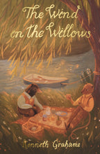 The Wind in the Willows paperback book by Kenneth Grahame with illustrated cover showing woodland animals having a picnic by the river