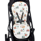 Diggers and Tractors pram liner fitted inside a stroller seat showing full padded coverage and universal strap slots