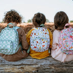 photoshoot lifestyle view of toddler backpacks, perfect for on the go and have matching accessories. can also be personalised with childs name. this print is clementine, parker and paloma