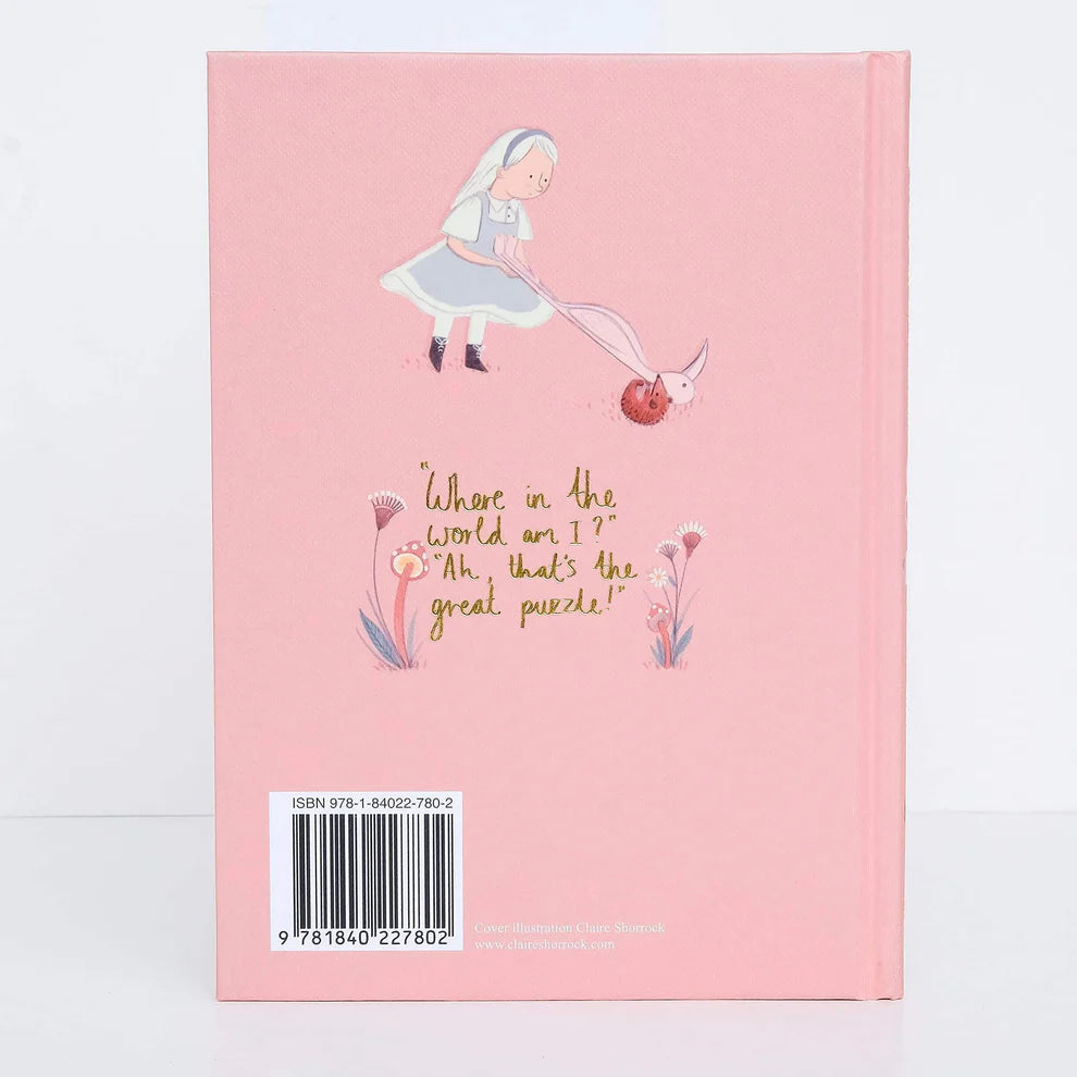 back of Alice in Wonderland collector’s edition hardback book with blush pink illustrated cover, gold foil lettering and sprayed heart cards page edges by Lewis Carroll. wordsworth collectors limited edition