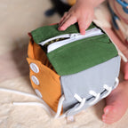 Little Lamb Kind busy cube close up textured fabric and fastenings