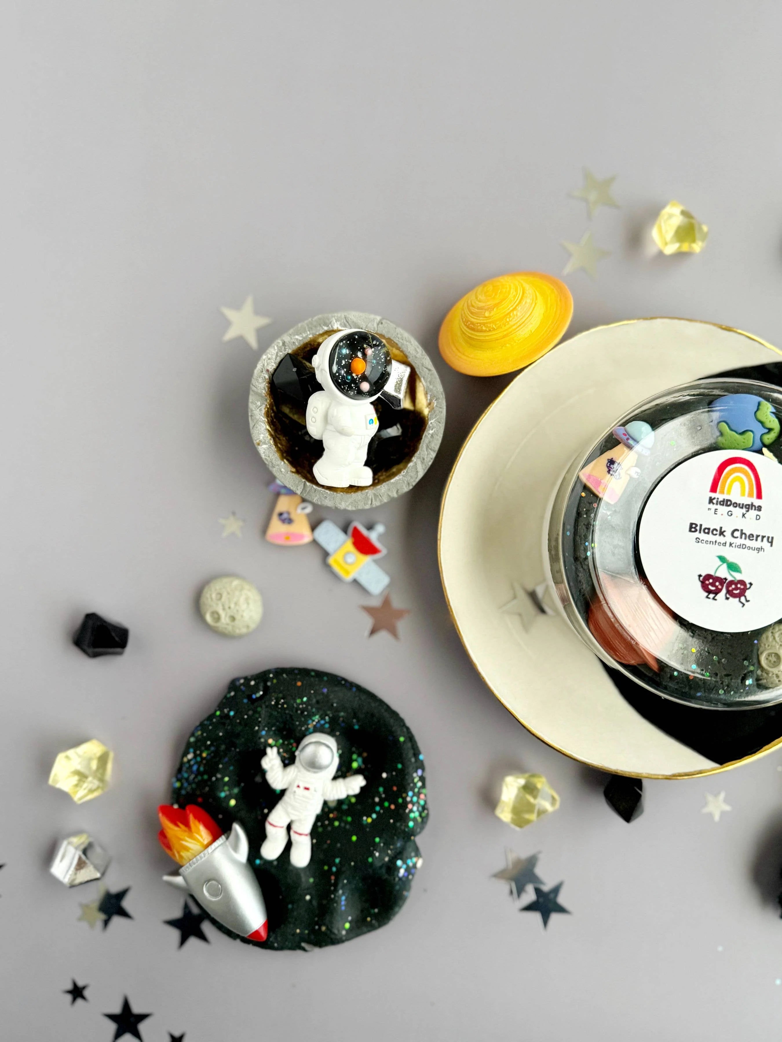 Outer space playdough kit with crescent moon, rocket, stars and space rocks designed for creative storytelling and fine motor sensory development