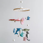 Handmade ocean themed baby mobile with felt turtles dolphins whales seahorses and stingrays by Ganapati