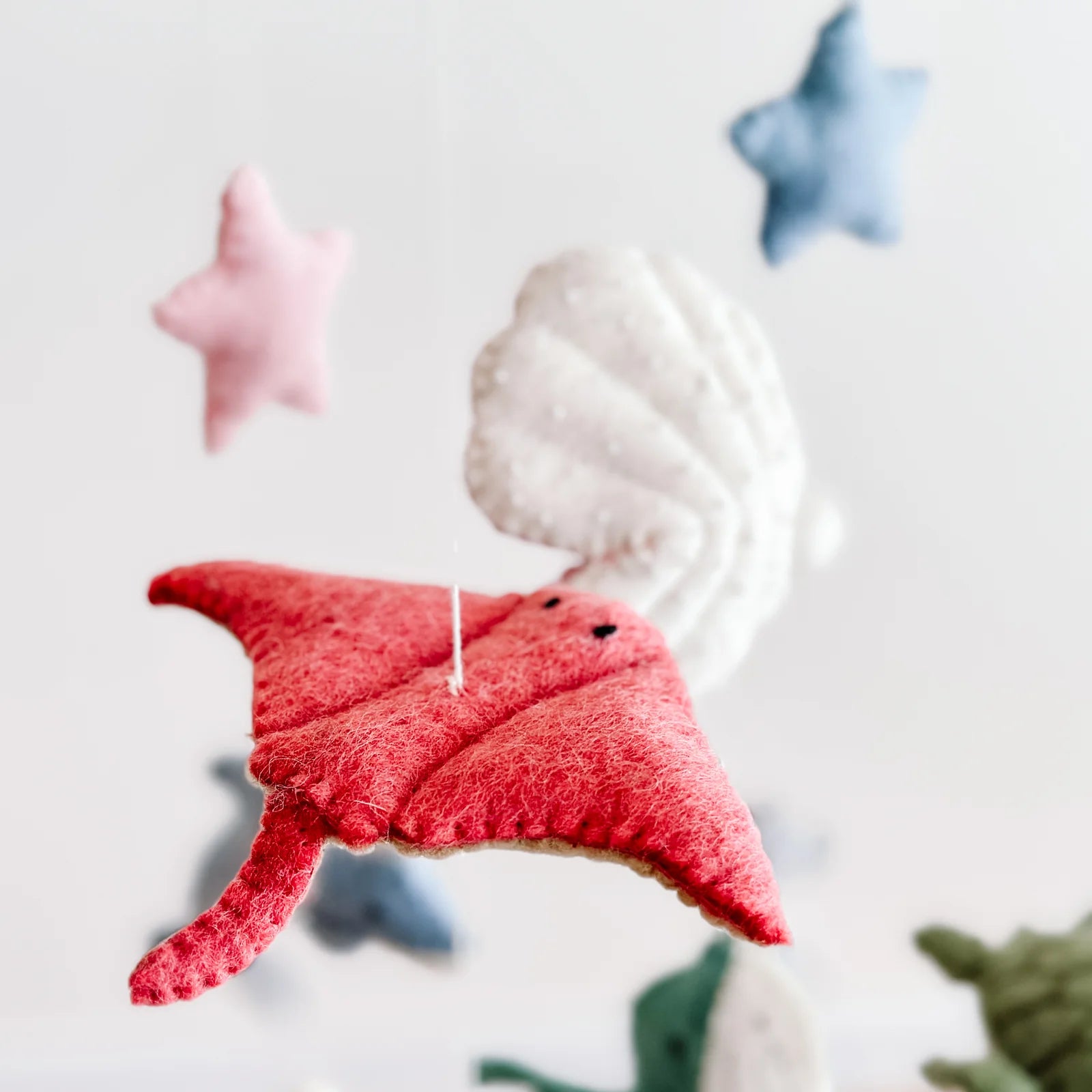 close up stingray felt on baby mobile
