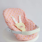 photoshoot of pink ducky Dolls Car Seat Capsule by tiny harlow