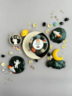 Kids space sensory play kit with textured glitter dough, astronaut figurine and planetary charms for STEM inspired pretend play and exploration