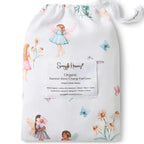 Snuggle Hunny Fairy Garden organic bassinet sheet in matching drawstring bag featuring delicate fairy and floral garden print