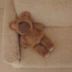 Caramel teddy Cozy Dinkum doll styled on neutral background