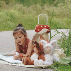 Child playing with Fenix Fox Cozy Dinkum doll Olli Ella