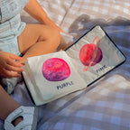 Space-themed sensory cloth book for babies