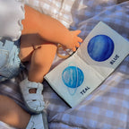 Fabric baby book with planets and colours