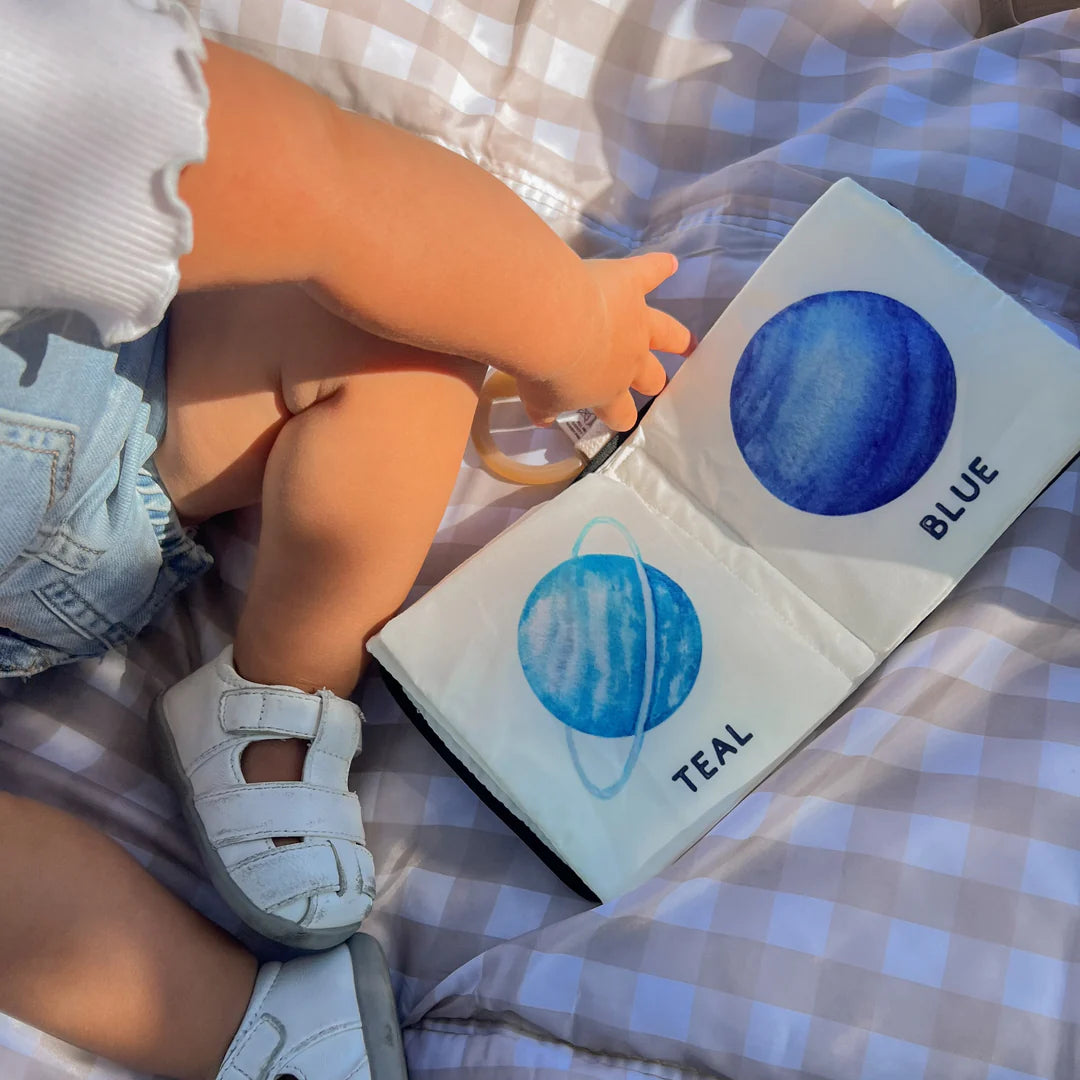 Fabric baby book with planets and colours