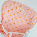 close up of pink ducky highchair for dolls made by tiny harlow