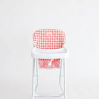 photoshoot of pink gingham highchair for dolls made by tiny harlow