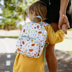 child wearing toddler backpacks, perfect for on the go and have matching accessories. can also be personalised with childs name. this print is clementine