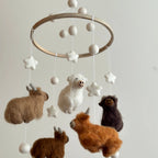 Farm themed felt baby mobile with Highland cows handcrafted from wool felt by Ganapati