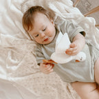 Handcrafted goose baby rattle with soft crochet details and gentle internal rattle