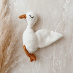 Goose crochet baby rattle by Blossom and Pear handcrafted in soft milk cotton