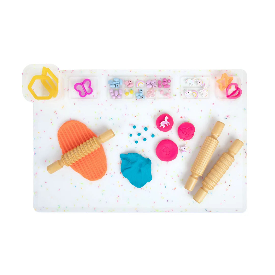 showing you how to use Re-CRAFT-able Silicone Creativity Mat Set in Confetti with silicone craft mat and cup. A fun and practical solution for mess free creative play.  made by little change creators