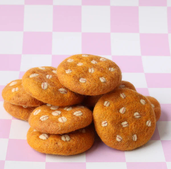 pile of felt Anzac biscuit toy handmade wool pretend play food oat cookie Juni Moon