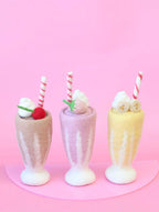 stock view of felt strawberry, chocolate and banana milkshake toy handmade wool pretend play drink diner Juni Moon