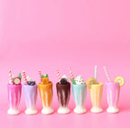 felt strawberry milkshake, chocolate milkshake, choc min milksahek, strawberry lemonade, lemonade, mango smoothie, dragonfruit smoothie and blueberry smoothie toy handmade wool pretend play drink diner Juni Moon