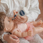 feeding baby with felt milk bottle toy handmade wool pretend play doll drink Juni Moon
