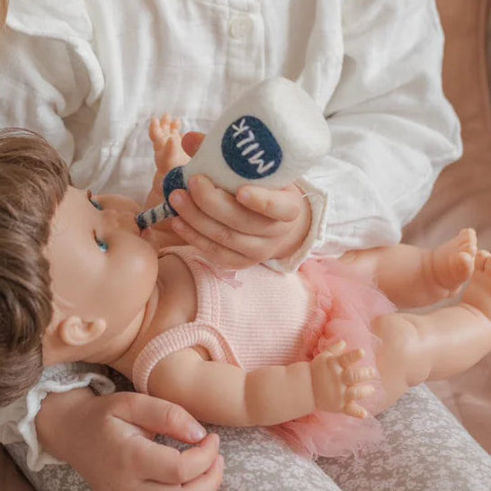 feeding baby with felt milk bottle toy handmade wool pretend play doll drink Juni Moon