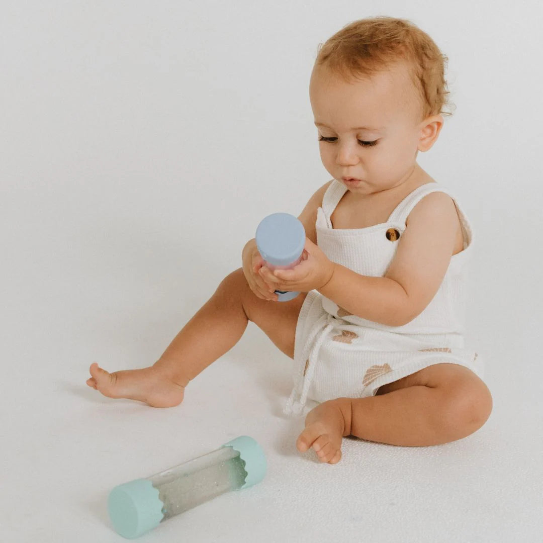 Baby Calm Down Bottle in Soft Blue with floating star glitter sensory elements for tummy time