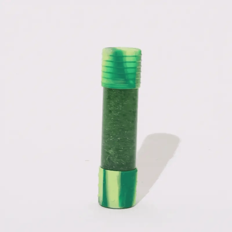 Jellystone Designs dinosaur DIY calm down bottle with dinosaur figure and green sensory elements